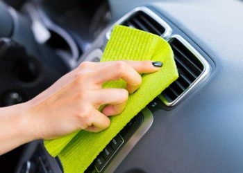 hand-with-microfiber-cloth-cleaning-car