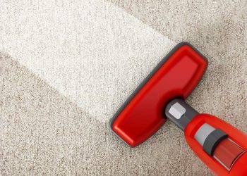 red-vacuum-cleaner-cleaning-carpet